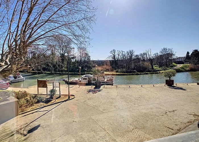 ** Superbe appartement sur le canal du midi **